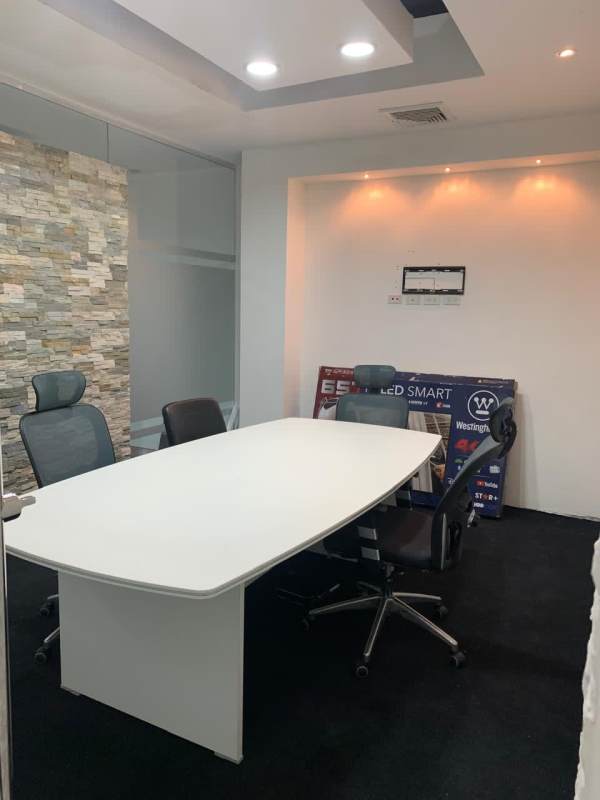 Spacious open office workspace with glass partitions and marble floors in Via España Obarrio Panama