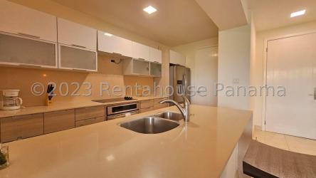 Open concept kitchen with granite countertop marble floors Casa Bonita Panama Pacifico