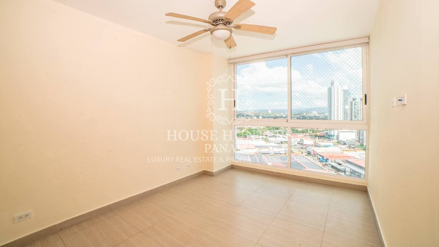 Kitchen with granite counters and appliances in condo at PH Asia Costa del Este Panama