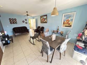 Bedroom with tiled floor, split AC unit, closet, Las Arboledas Panama