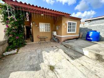 Modern kitchen with granite countertops and cabinets in La Chorrera house for sale