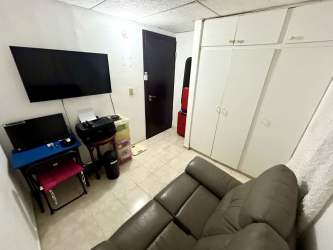 Bedroom with ceramic floors, large window in La Chorrera remodeled house