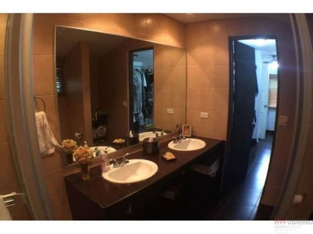 Dining room with window, wall art, seating area Panama Diablo Heights