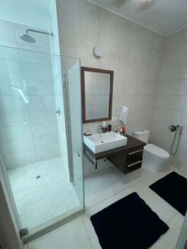 Luxurious bathroom with double sink vanity mirror and walk-in shower San Francisco Panama City