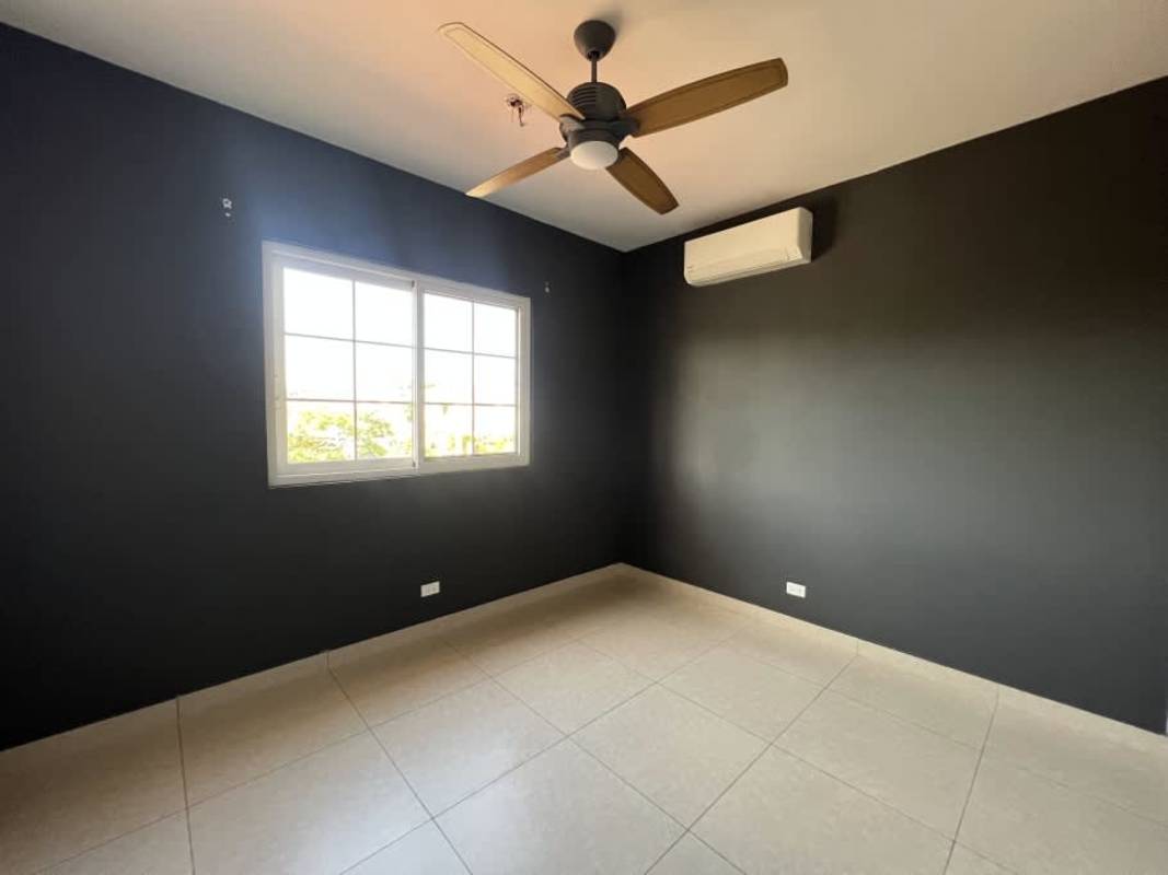 Empty bedroom with tile floors, split AC ready, and closet in PH Reserva de Versalles Panama