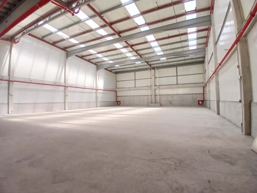 Large empty warehouse with skylights and high ceiling in Costa Sur Panama
