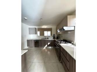 Covered backyard terrace with garden view in Bosques del Pacífico Panama Pacifico rental