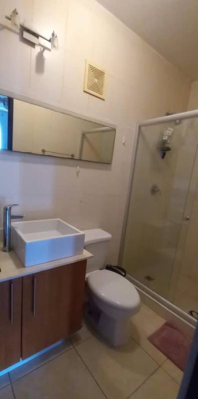 Contemporary bathroom with glass shower enclosure and modern fixtures PH Sky Blue Tower Panama