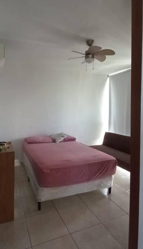 Spacious bedroom with en-suite bath, large window and city view at PH Sky Blue Tower San Francisco Panama