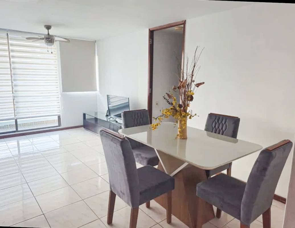Open dining and living room with modern decor in PH Pacific Wind Punta Pacífica Panama City