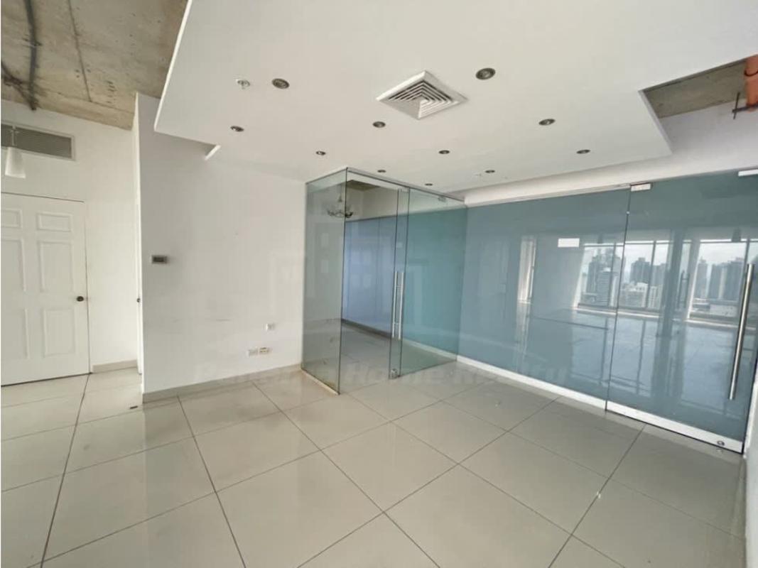 Spacious office area with glass walls, panoramic ocean city views in PH BICSA Tower, Panama City