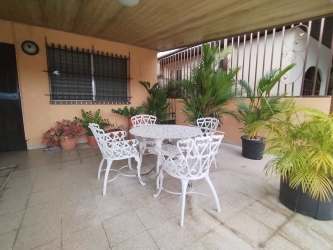 Covered terrace patio with outdoor dining table at home in Santa Clara Panama