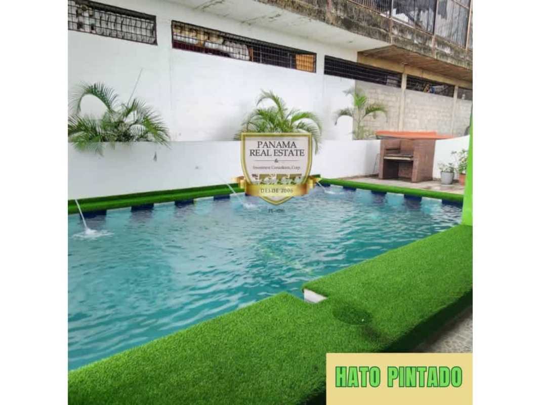 Outdoor pool with social spaces and BBQ area in Vista Bela Tower Hato Pintado Panama