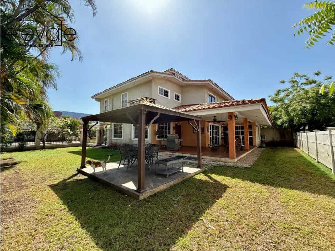 Elegant dining room adjacent to open kitchen in Costa Bella Costa del Este home