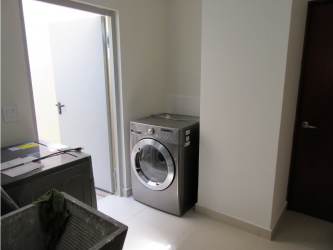 Kitchen with granite countertops, stove, oven in River Valley House Panama Pacifico