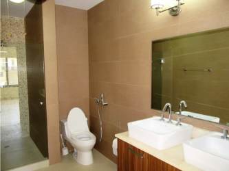 Swimming pool and gardens in River Valley gated community Panama Pacifico