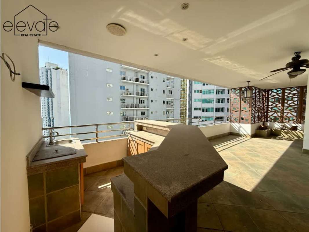 Spacious living room with marble flooring, natural light, and skyline view at PH Tuscany Penthouse Panama