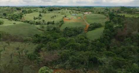 Aerial photo showing extensive rural farmland with forest and hills in Santa Rita Capira Panama