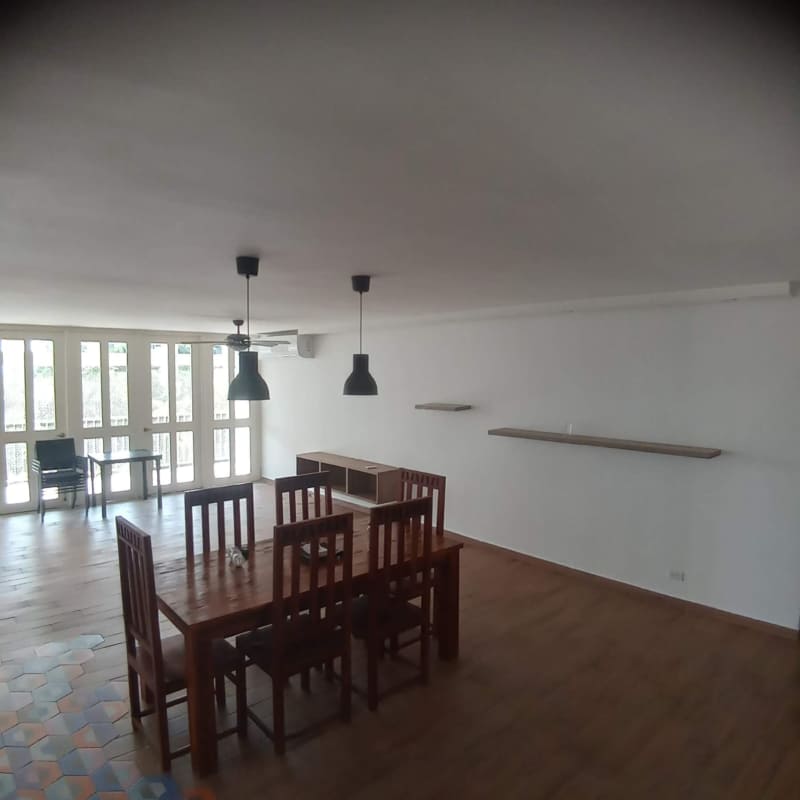Kitchen with granite countertops and wood cabinets at Edificio Sandra La Cresta Panama