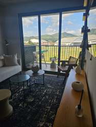 Bedroom with window overlooking greenery PH Centriqo Panama Pacifico