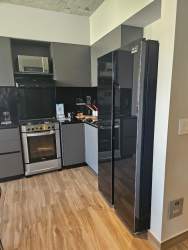 Contemporary kitchen design with granite countertops PH Centriqo Panama Pacifico