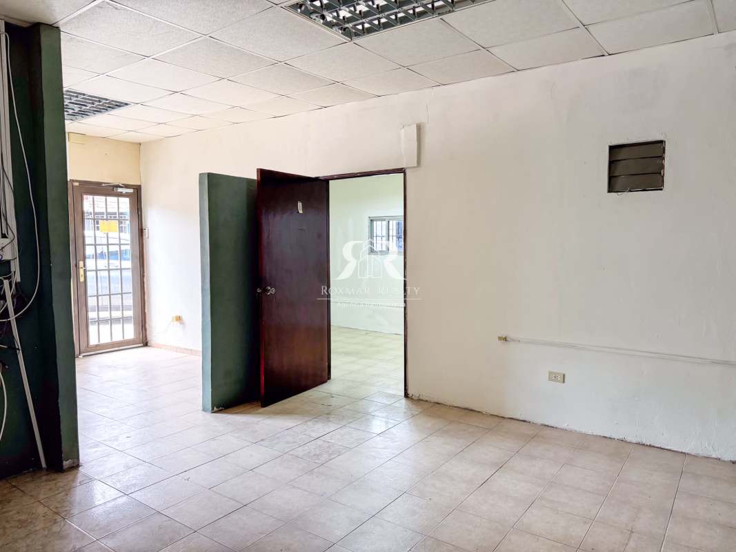 Large industrial warehouse area with scaffolding in commercial galera Parque Lefevre Panama City