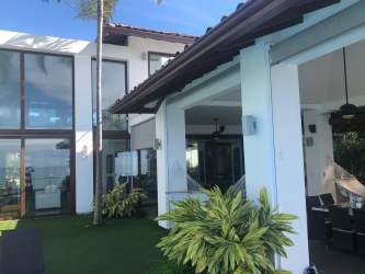 Spacious master bedroom with balcony and direct sea view in beachfront mansion at Coronado Panama