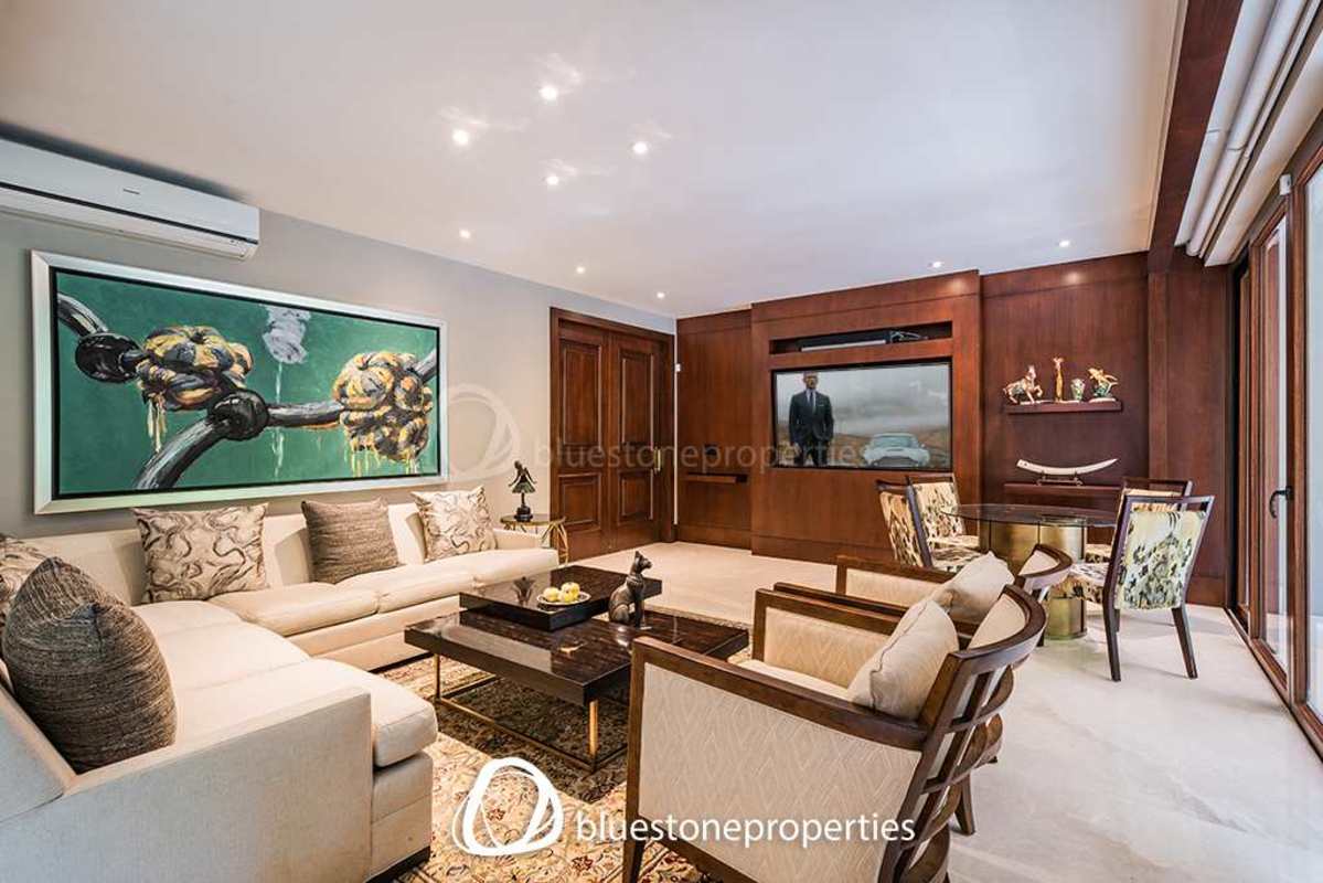 Spacious living room with grand piano cathedral ceilings luxury mansion Altos del Golf Panama