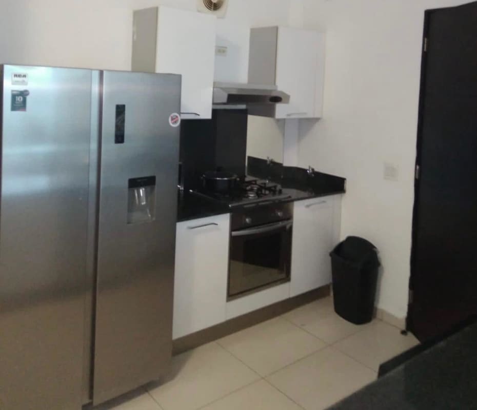 Modern kitchen with granite countertops, stainless appliances and breakfast bar in PH BICSA Ave Balboa Panama
