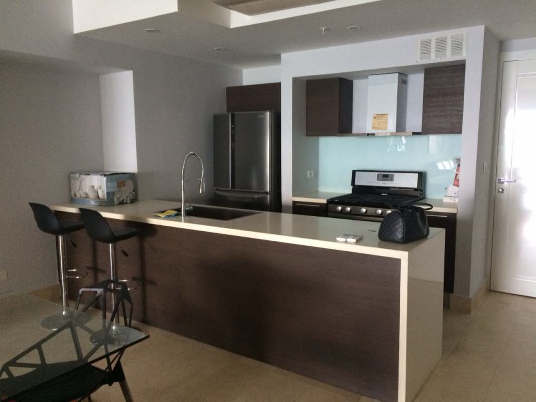 Dining area and modern kitchen with mirror wall PH YOO Panama