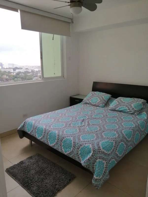Bedroom with closet, window, natural light PH Majestic Gardens Edison Park Panama
