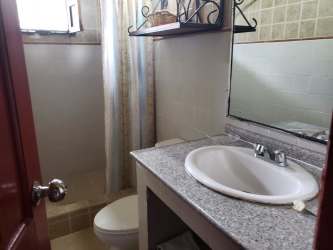 Large covered terrace with garden view, rustic beams in mountain farm Pozo Azul Penonomé