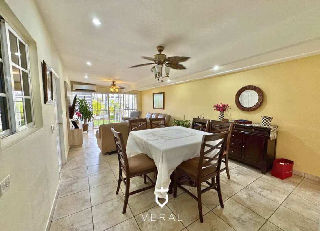 Accessible bedroom featuring wide entry, disability-adapted bathroom Betania Panama house
