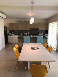 Open living dining room with natural light in luxury villa Buenaventura Panama