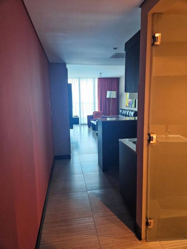 Spacious bedroom with two beds, city view window, blackout curtains PH Megapolis Punta Paitilla Panama