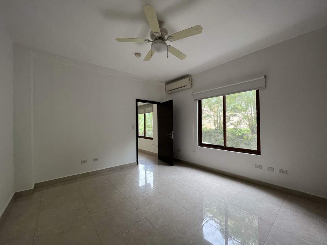 Modern bathroom with double vanity, glass shower enclosure in Panama luxury house