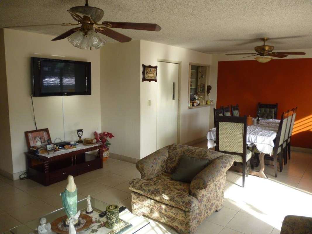 Living room with balcony access ceiling fans open plan Villa de las Fuentes Panama