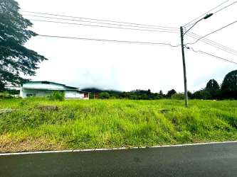Open grassy land with road and power lines corner site in Volcán Chiriquí Panama