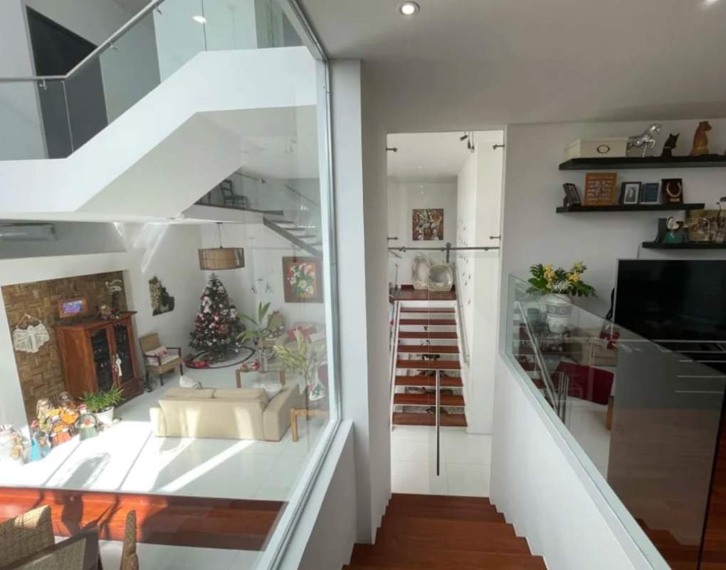 Sleek floating staircase inside luxury house in Altos de Golf Panama City