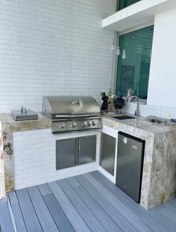 Open plan living room with ceiling fans, floor-to-ceiling windows in luxury house Altos de Golf Panama City
