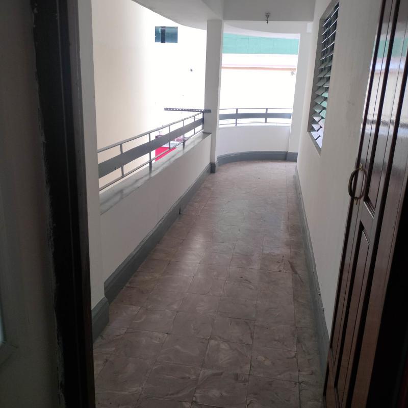 Balcony corridor with railing windows in PH El Cangrejo apartment Panama City