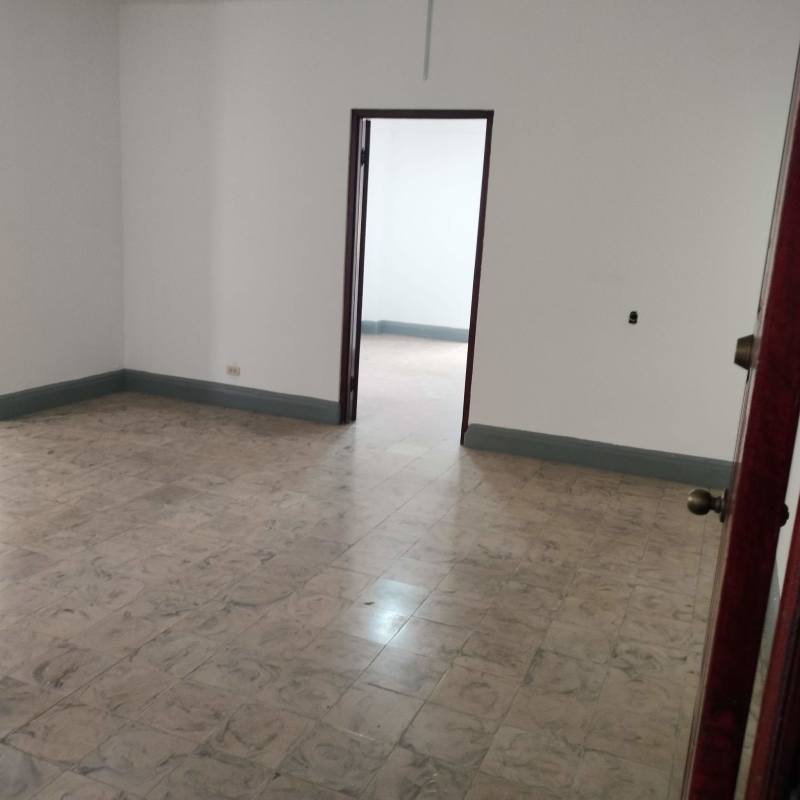 Empty interior space with tile flooring and white walls in PH El Cangrejo apartment