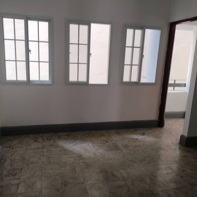 Empty room with ceramic tile floors and white walls in PH El Cangrejo Panama City apartment