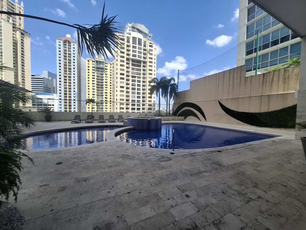 Modern living room with panoramic windows and ocean views in PH Ocean Pacific, Panama City