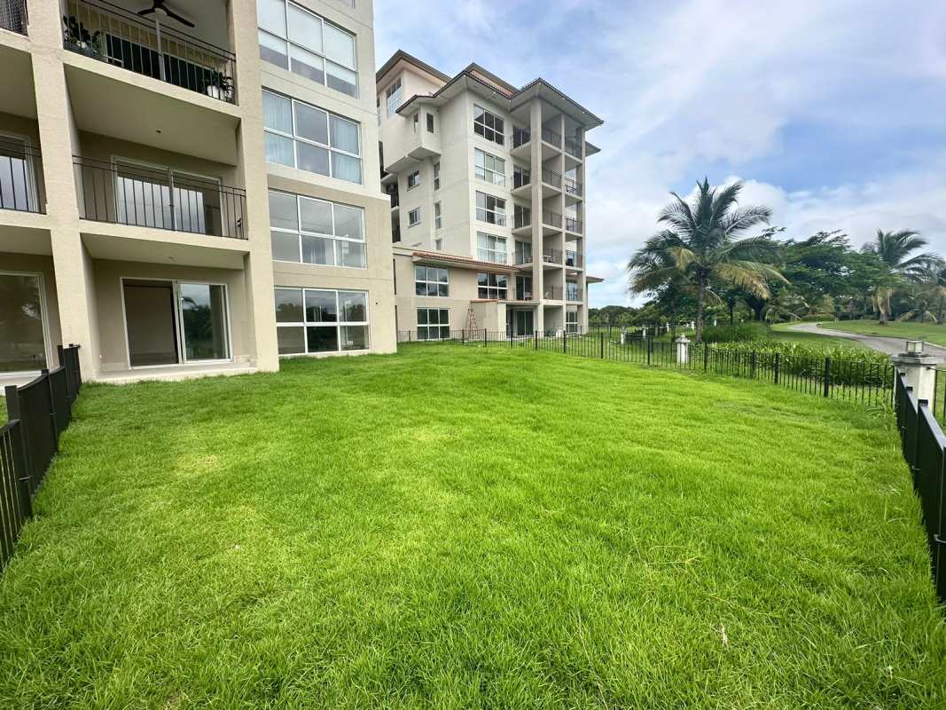 Spacious gourmet kitchen with marble floors, granite countertops, center island in The Reserve Santa Maria Panama