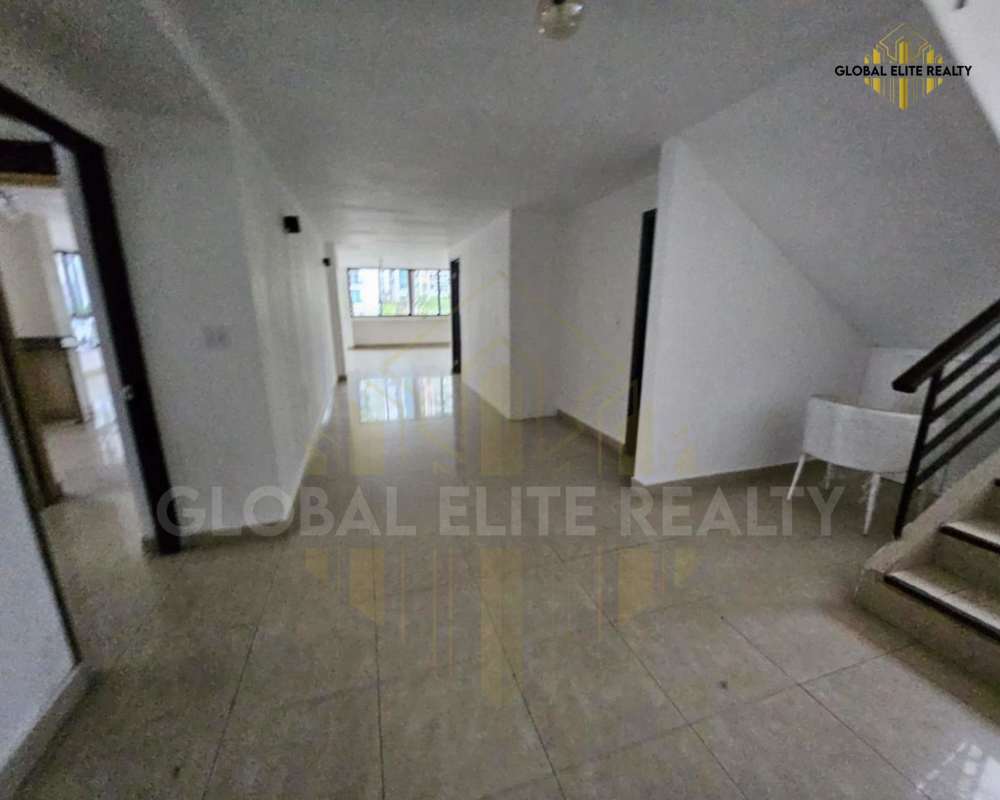 Bright apartment living area with large windows overlooking city Bella Vista Panama