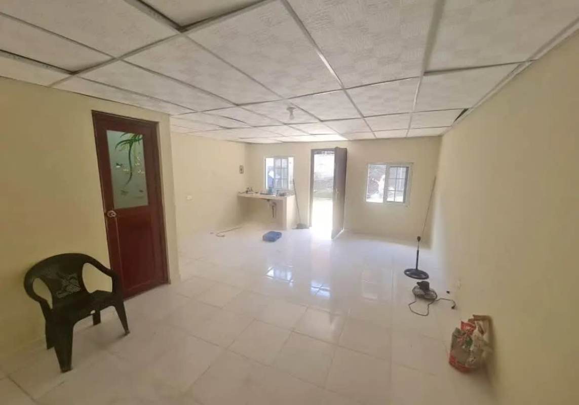 Affordable rental room interior with white walls, tiled floor in Tocumen Panama