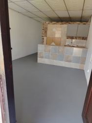 Empty bedroom with ceramic tile floors and white walls in rental apartment Vista Alegre Panama