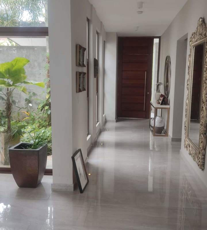 Spacious bedroom with large windows and ensuite bathroom Clayton Panama luxury home