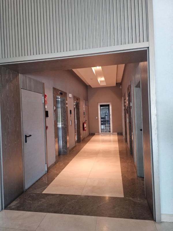 Spacious bedroom with large window and built-in closet in PH Asia Costa del Este